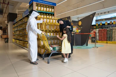 Emirati Family Shopping at Saudi Arabia Hypermarket