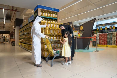 Emirati Family Shopping in Saudi Arabia Hypermarket