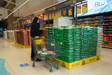 Arab Woman in Saudi Supermarket Shopping for Groceries