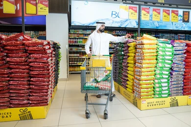 Emirati Man Shopping in Supermarket Aisle
