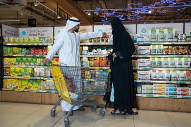 Emirati Couple Shopping in Supermarket