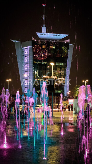 A picture of the U-Walk complex in Riyadh, Saudi Arabia in night mode, architecture in Saudi Arabia, tourism in Saudi Arabia, a wonderful night view of the U-Walk complex in Riyadh, fountain, skyscrapers