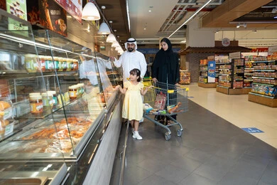 Emirati Family Shopping in UAE Supermarket