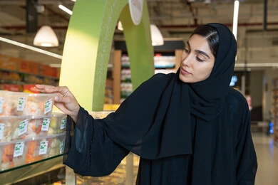 Emirati Woman Shopping in Modern Supermarket