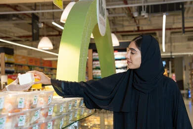 Emirati Woman in Abaya Shopping at Supermarket