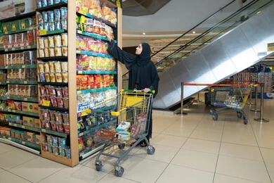 Emirati Woman Shopping in Dubai Supermarket