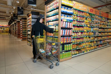 Emirati Woman Shopping in Supermarket Aisle