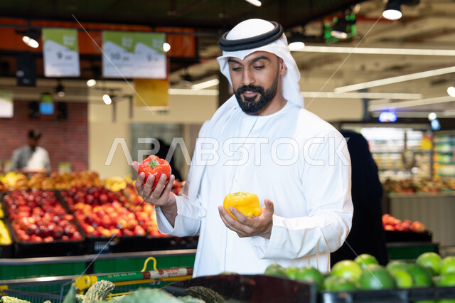 Emirati Man Shopping for Vegetables in UAE Supermarket