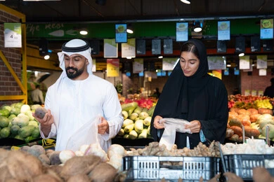 Emirati Couple Shopping for Fresh Vegetables in UAE