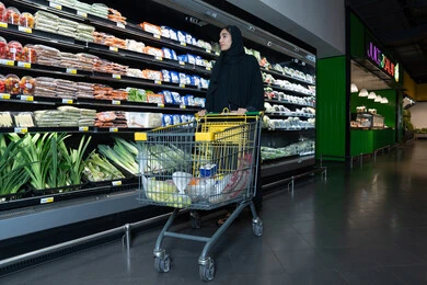 Emirati Woman Shopping in Supermarket Produce Aisle