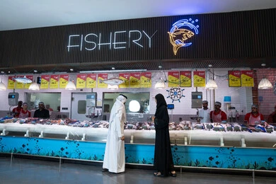 Emirati Couple Shopping at Fresh Fish Market UAE