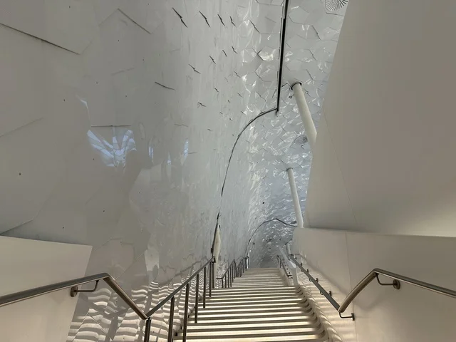 Architectural interior engineering designs, October 5, 2025, a place for readers and lovers of science, books, and knowledge, the largest public library in Saudi Arabia, King Abdulaziz Center for World Culture (Ithra) in Dhahran, Saudi Arabia, books, novels, and stories arranged on the shelves.