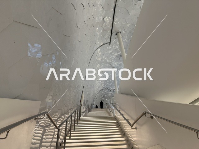 Architectural interior engineering designs, October 5, 2025, a place for readers and lovers of science, books, and knowledge, the largest public library in Saudi Arabia, King Abdulaziz Center for World Culture (Ithra) in Dhahran, Saudi Arabia, books, novels, and stories arranged on the shelves.