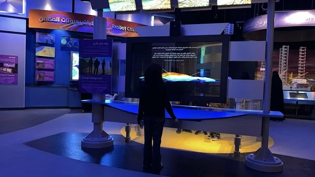 A boy stands in front of an electronic display at the Energy Exhibition in the King Abdulaziz Center for World Culture (Ithra) in Dhahran, Eastern Province, Saudi Arabia, on January 19, 2026. It is an interactive event that highlights energy sources and modern technologies, featuring educational exhibits and innovative scientific experiments, informative content that connects sustainability and innovation, and inspiring cultural atmospheres suitable for all age groups.