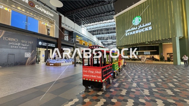 You Walk Jeddah, a complete urban destination for walking, entertainment, and shopping, You Walk in the city of Jeddah, Saudi Arabia, is an open promenade with a modern design, featuring international and local restaurants and cafes, diverse brands, seasonal events and recreational activities, outdoor seating and social spaces, and a vibrant family and youth atmosphere.