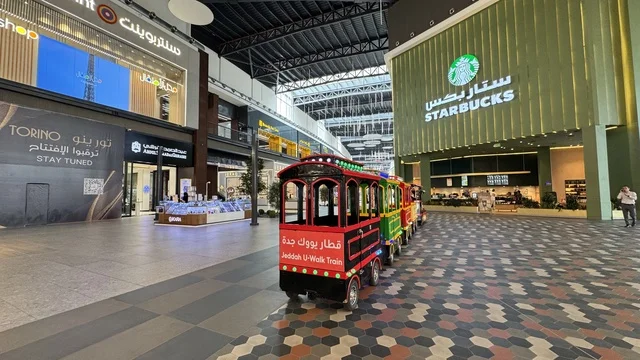 You Walk Jeddah, a complete urban destination for walking, entertainment, and shopping, You Walk in the city of Jeddah, Saudi Arabia, is an open promenade with a modern design, featuring international and local restaurants and cafes, diverse brands, seasonal events and recreational activities, outdoor seating and social spaces, and a vibrant family and youth atmosphere.