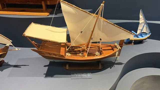 Miniature models of traditional sailing ships, displays of the stages of traditional shipbuilding and the tools and materials used, the wooden ships festival on the Al-Hamra beach in Jeddah, Saudi Arabia from January 12 to 16, 2026, maritime heritage, interactive activities, and cultural performances.
