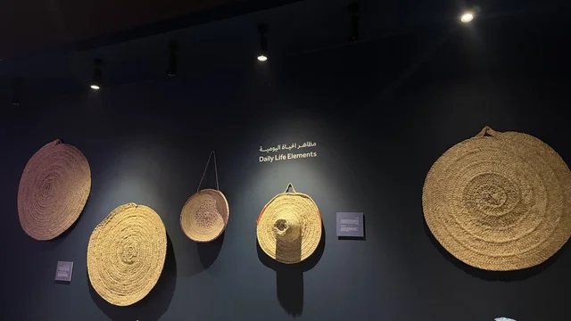 Woven circular plates made from natural materials, displays of traditional shipbuilding stages and the tools and materials used, the wooden ships festival on the Al-Hamra beach in Jeddah, Saudi Arabia from January 12 to 16, 2026, maritime heritage, interactive activities, and cultural performances.