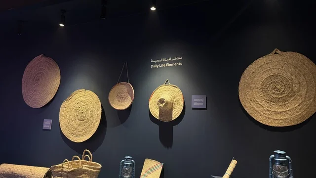 Woven circular plates made from natural materials, displays of traditional shipbuilding stages and the tools and materials used, the wooden ships festival on the Al-Hamra beach in Jeddah, Saudi Arabia from January 12 to 16, 2026, maritime heritage, interactive activities, and cultural performances.