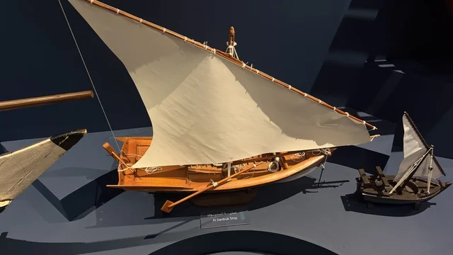 Miniature models of traditional sailing ships, displays of the stages of traditional shipbuilding and the tools and materials used, the wooden ships festival on the Al-Hamra beach in Jeddah, Saudi Arabia from January 12 to 16, 2026, maritime heritage, interactive activities, and cultural performances.