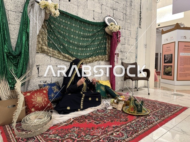 The art of henna engraving, a shopping experience between the fragrance of time and the authenticity of place, the "Life of the Past" event in the Eastern Province of Dammam during January 2026 in the Kingdom of Saudi Arabia, features the characteristics of the past and ancient life through a heritage atmosphere.