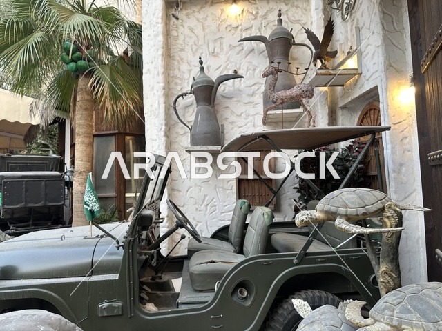 A military vehicle at the Al-Falwah and Al-Jawhara Museum in the Al-Nuzha neighborhood of Dammam, Eastern Province, Saudi Arabia, on February 21, 2018. It is a distinctive educational and tourist destination, featuring halls for showcasing Saudi heritage, classic cars, documentation of handicrafts and Saudi identity, a heritage and cultural landmark displaying the history of traditional clothing and jewelry, and Islamic art.