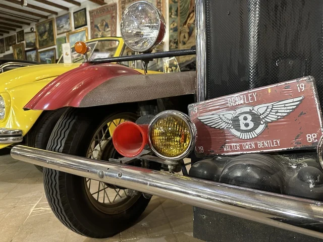 Classic vintage cars at the Al-Falwah and Al-Jawhara Museum in the Al-Nuzha neighborhood of Dammam, Eastern Province, Saudi Arabia, on February 21, 2018, a distinctive educational and tourist destination, documenting handicrafts and Saudi identity, a heritage and cultural landmark showcasing the history of traditional clothing and jewelry, Saudi heritage, Islamic art.