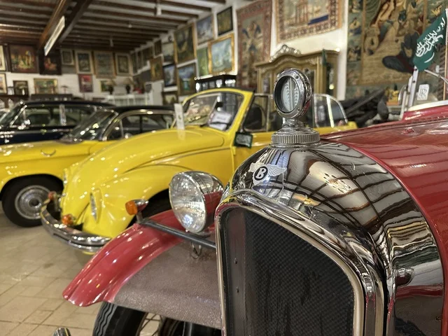 Classic vintage cars at the Al-Falwah and Al-Jawhara Museum in the Al-Nuzha neighborhood of Dammam, Eastern Province, Saudi Arabia, on February 21, 2018, a distinctive educational and tourist destination, documenting handicrafts and Saudi identity, a heritage and cultural landmark showcasing the history of traditional clothing and jewelry, Saudi heritage, Islamic art.