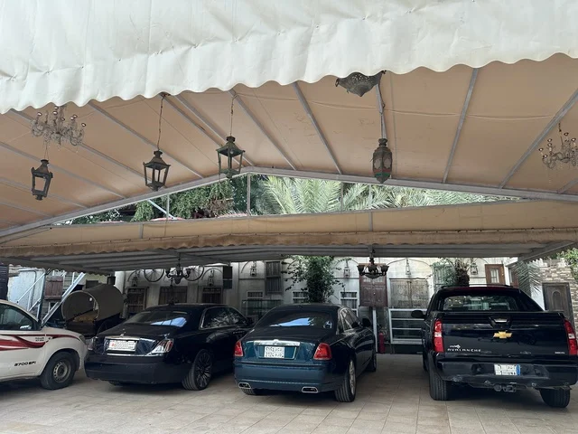 Parking in the outdoor parking lot of the Al-Falwah and Al-Jawhara Museum in the Al-Nazhah neighborhood of Dammam, Eastern Province, Saudi Arabia, on February 21, 2018, is a distinctive educational and tourist destination, showcasing Saudi heritage, documenting handicrafts and Saudi identity, a heritage and cultural landmark displaying the history of traditional clothing and jewelry, Islamic art.