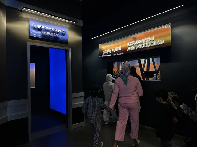 Visitors gathered in front of the Exploration and Production section at the Energy Exhibition in the King Abdulaziz Center for World Culture (Ithra) in Dhahran, Eastern Province, Saudi Arabia, on January 19, 2026. The event features informative content that connects sustainability and innovation, highlighting energy sources and modern technologies, with educational exhibits and innovative scientific experiments, creating an inspiring cultural atmosphere suitable for all age groups.