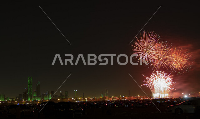 صورة لمركز الملك عبدالله المالي ( كافد ) في الرياض بالمملكة العربية السعودية ، الأبراج المالية والاقتصادية والمنشأت المعمارية مضاء بالاخضر احتفالا باليوم الوطني السعودي ، إطلالة ليلية لأبراج الرياض تحتفل بالعيد الوطني السعودي ، فعاليات موسم الرياض