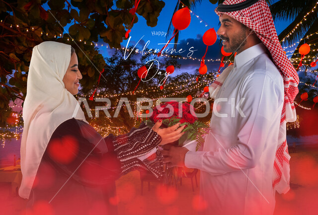 صورة زوجان سعيدان يحتفلان بعيد الحب , الزوج يقدم لزوجته باقة ورد , الزوجة تعبر بإيماءات وجه ويدين تدل على الدهشة والفرح , عيد الأم , يوم الفلنتاين , أعياد ومناسبات , عيد الميلاد , خلفية الحب والرومانسية .