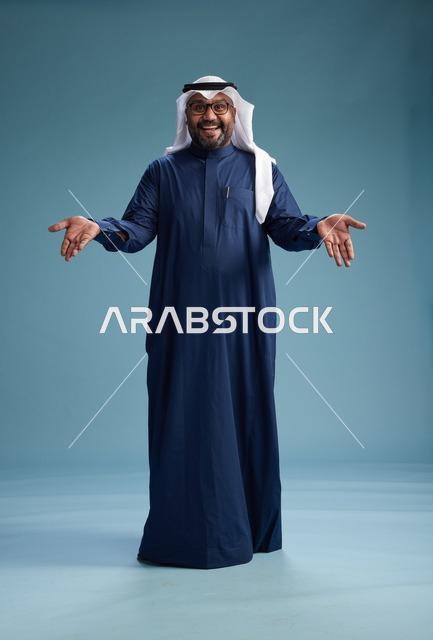 A portrait of a Saudi man in a blue thobe and white ghutrah in a welcoming pose, gestures of greeting and welcome, with a cheerful face, full body, blue background.