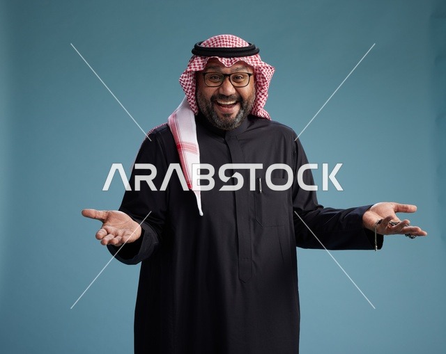 A smiling Saudi man wearing a black thobe with a shemagh and agal, with various hand gestures and movements, against a blue background.