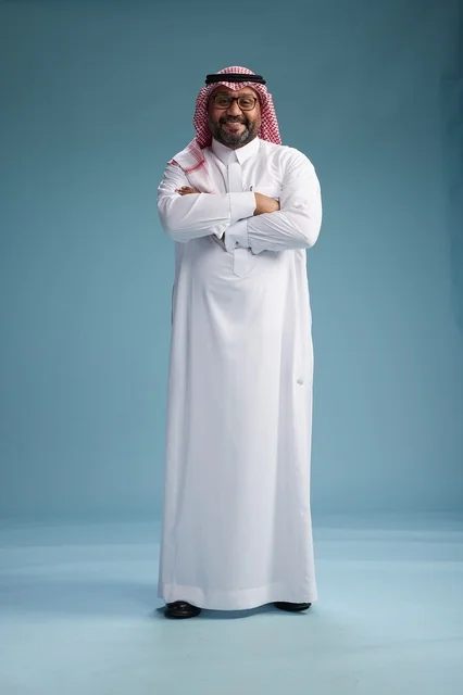 A portrait of an Arab Saudi Gulf man wearing a white thobe and a shemagh, with various gestures and movements, full body, blue background.