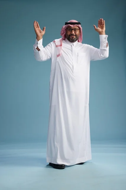 A portrait of an Arab Saudi Gulf man wearing a white thobe and a shemagh, with various gestures and movements, full body, blue background.