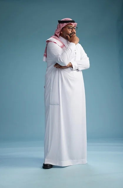 A portrait of an Arab Saudi Gulf man wearing a white thobe and a shemagh, with various gestures and movements, full body, blue background. A portrait of an Arab Saudi Gulf man wearing a white thobe and a shemagh, with various gestures and movements, full body, blue background.