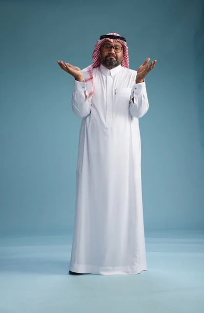 A portrait of an Arab Saudi Gulf man wearing a white thobe and a shemagh, with various gestures and movements, full body, blue background.