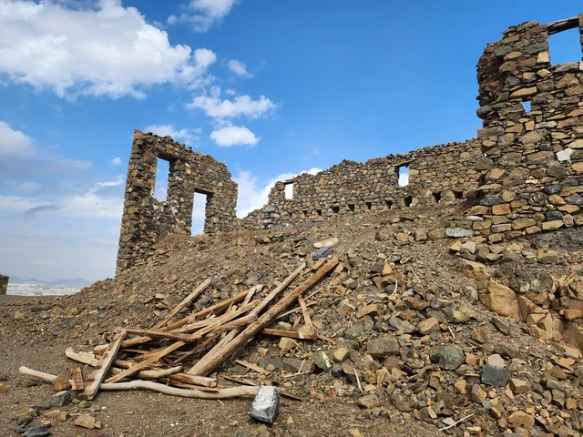 Islamic and religious sacred places in the Kingdom of Saudi Arabia, the seven ancient archaeological mosques at the top of the mountain during the day, the architecture in the old style, the Trench Mosque on Mount Sal' in Medina.