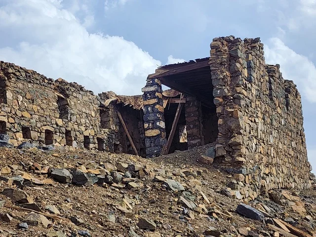 Islamic and religious sacred places in the Kingdom of Saudi Arabia, the seven ancient archaeological mosques at the top of the mountain during the day, the architecture in the old style, the Trench Mosque on Mount Sal' in Medina.