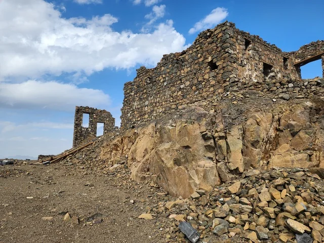 The seven ancient archaeological mosques at the top of the mountain during the day, the architecture in the old style, Islamic and religious sacred places and areas in the Kingdom of Saudi Arabia, the Trench Mosque on Mount Sal' in Medina.