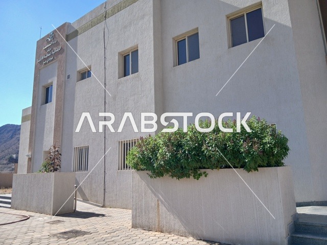 The primary healthcare center in the Al-Baha region in the village of Dhai Al-Ain, an archaeological site in the south of the Kingdom of Saudi Arabia, is surrounded by famous historical tourist attractions, trees, and green plants on the highlands and mountain peaks.