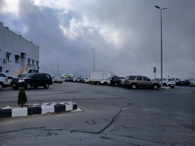 The view of the cloudy sky in the mountainous area, the road to King Fahd Hospital in Al-Baha, health centers, hospitals, and places for patient care in the Kingdom of Saudi Arabia, preparing and equipping cities in the mountains, peaks, and rocky elevations.