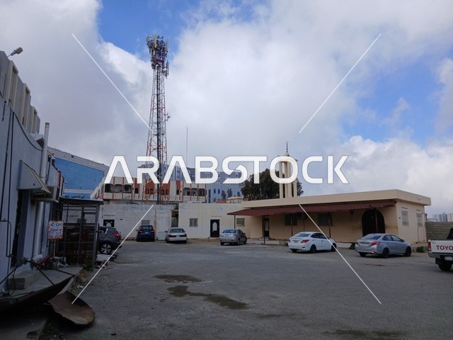 The city of Al-Baha in the Kingdom of Saudi Arabia, streetlights in the streets and roads of the area, the terrain, peaks, and mountainous elevations in tourist areas.