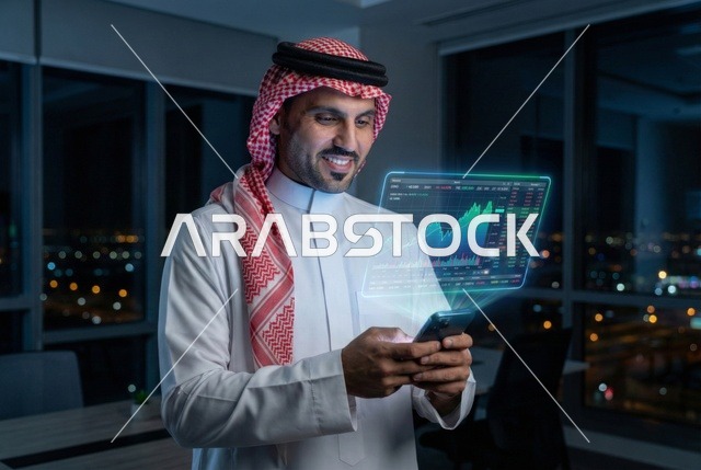 رسوم بيانية إحصائية للبورصة المالية بتقنية الهولوجرام ثلاثية الأبعاد، التجاره الإلكترونيه الرقمية، رجل اعمال عربي سعودي يقوم بمتابعة مؤشرات الأسهم ومخططات الإستثمار المالي عبر جهاز تقني حديث , النمو والتطور في المجال الاقتصادي في السعودية