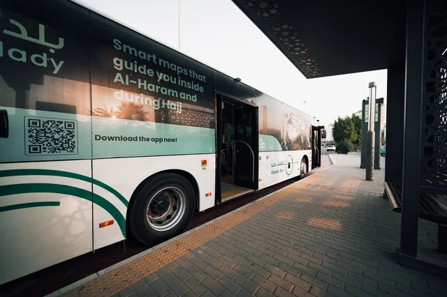 Makkah Transport Buses, a luxury bus with a modern design in Makkah, a transportation stop during the day, providing transportation for citizens in the Kingdom of Saudi Arabia.