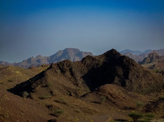 The mountains of Hatta tourist city in the Emirate of Dubai, United Arab Emirates, the mountainous highlands, the backdrop of mountainous nature, tourism in the UAE, Hatta mountains.