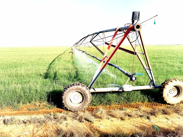 Drone for irrigating agricultural lands and green fields, increasing the production and quality of agricultural crops, advanced machines and devices, advanced irrigation methods in the Kingdom of Saudi Arabia, the development of modern technology and techniques in irrigation and watering crops.