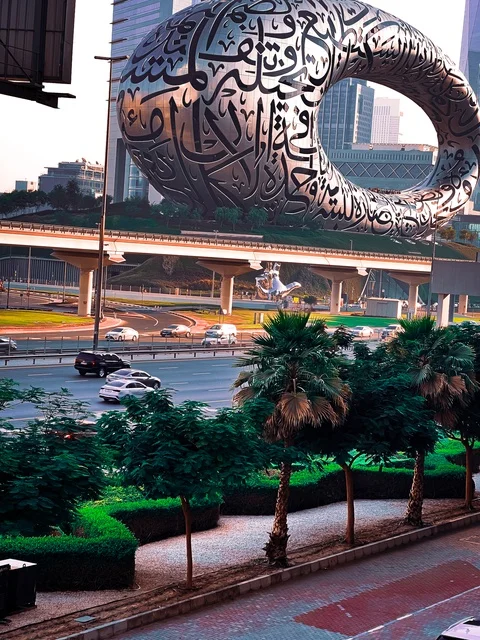 The Museum of the Future building in the Emirate of Dubai, famous landmarks and tourist attractions in the United Arab Emirates, the architectural engineering art of modern-style towers and skyscrapers, distinctive designs and decorations.