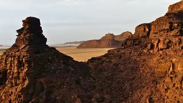 A panoramic view of the mountains and rock formations in Al-Ula Governorate, the rock formations in Al-Ula in the Kingdom of Saudi Arabia, famous tourist spots, ancient historical archaeological landmarks.